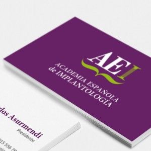 Aplicación del logo de la Academia Española de Implantología en tarjetas de visita